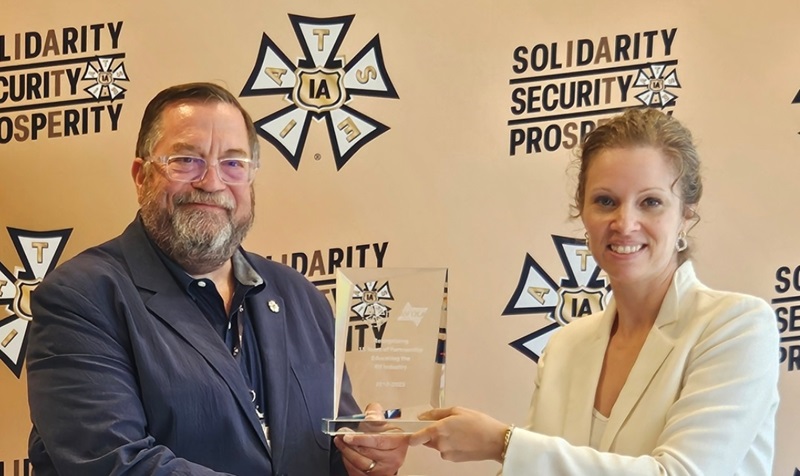 IATSE & AVIXA spokespeople posing for camera.