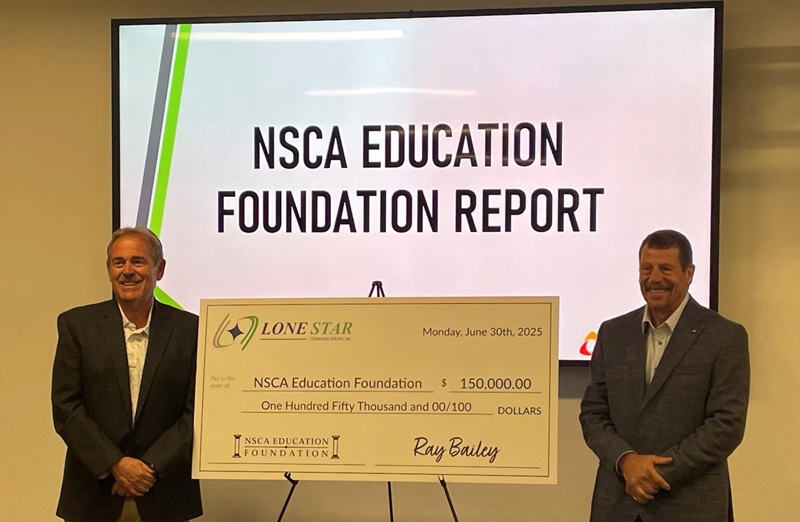 Ray Bailey presenting check to NSCA Education Foundation.