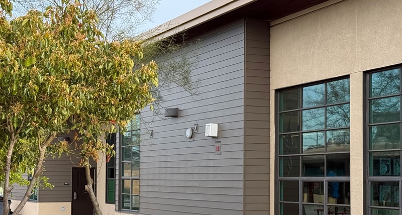 AtlasIED speakers installed on building exteriors.