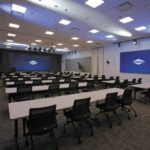 Inside Extron's award-winning Anaheim hybrid event space, built with 13 Panasonic PTZ cameras for broadcast-quality production.