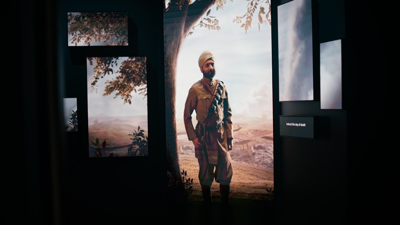 Holograph of WWI soldier standing near a tree.